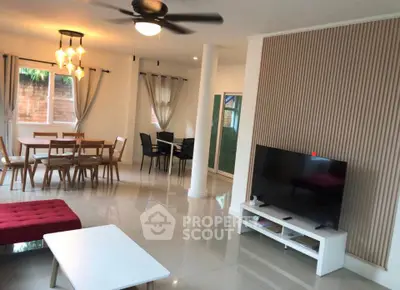 Spacious modern living room with dining area and stylish decor