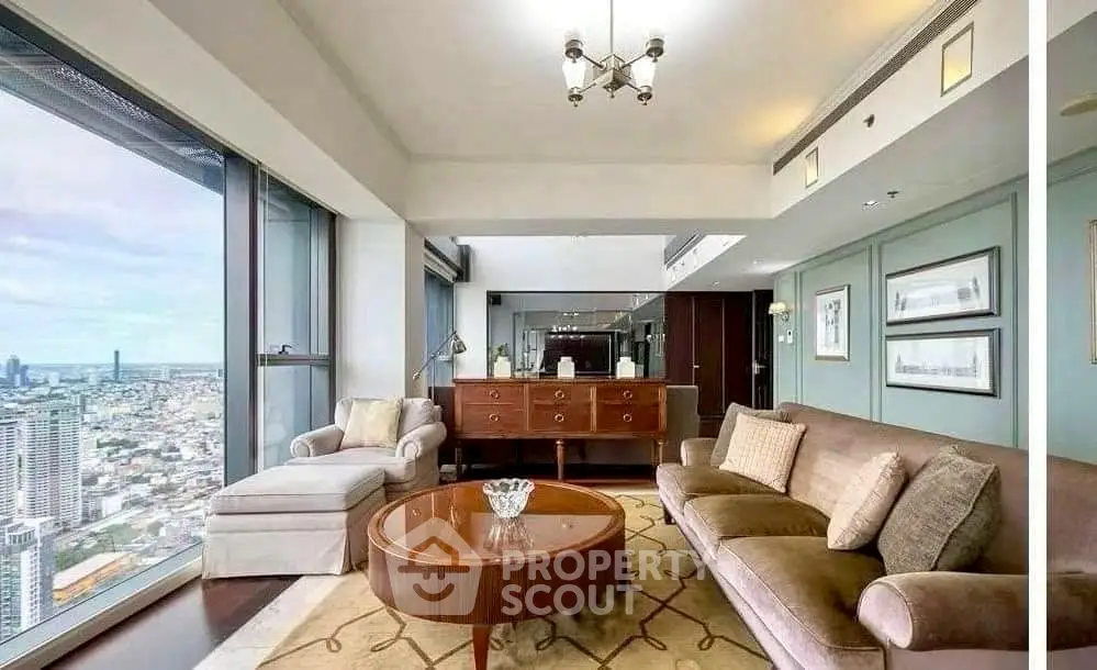 Luxurious high-rise living room with panoramic city views and elegant furnishings.