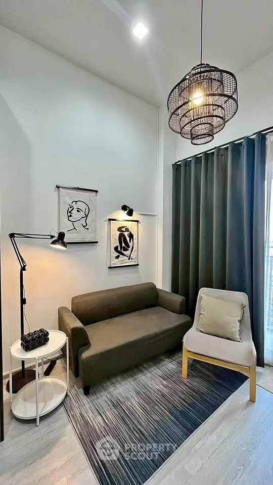 Stylish modern living room with cozy sofa, chic lighting, and elegant decor in a contemporary apartment.