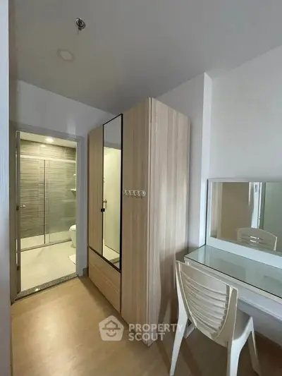 Modern bedroom with ensuite bathroom and stylish wardrobe