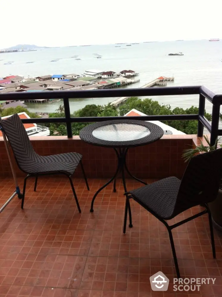 Spacious balcony with breathtaking sea views, perfect for alfresco dining and relaxation, featuring modern outdoor furniture.