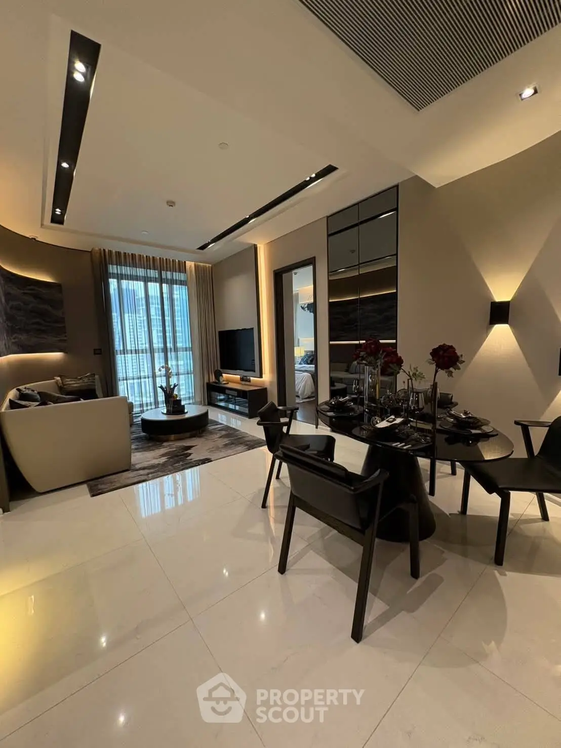 Luxurious modern living room with elegant dining area and stylish decor, perfect for sophisticated urban living.