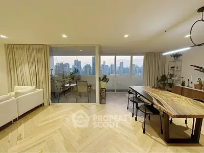 Luxurious living room with stunning city view and elegant dining area