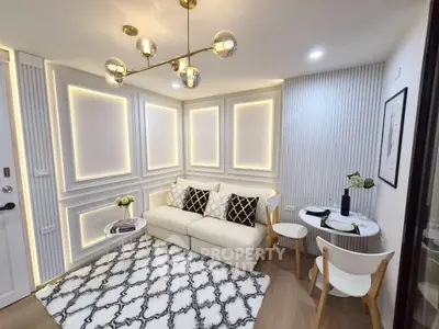 Stylish modern living room with elegant lighting and cozy seating area