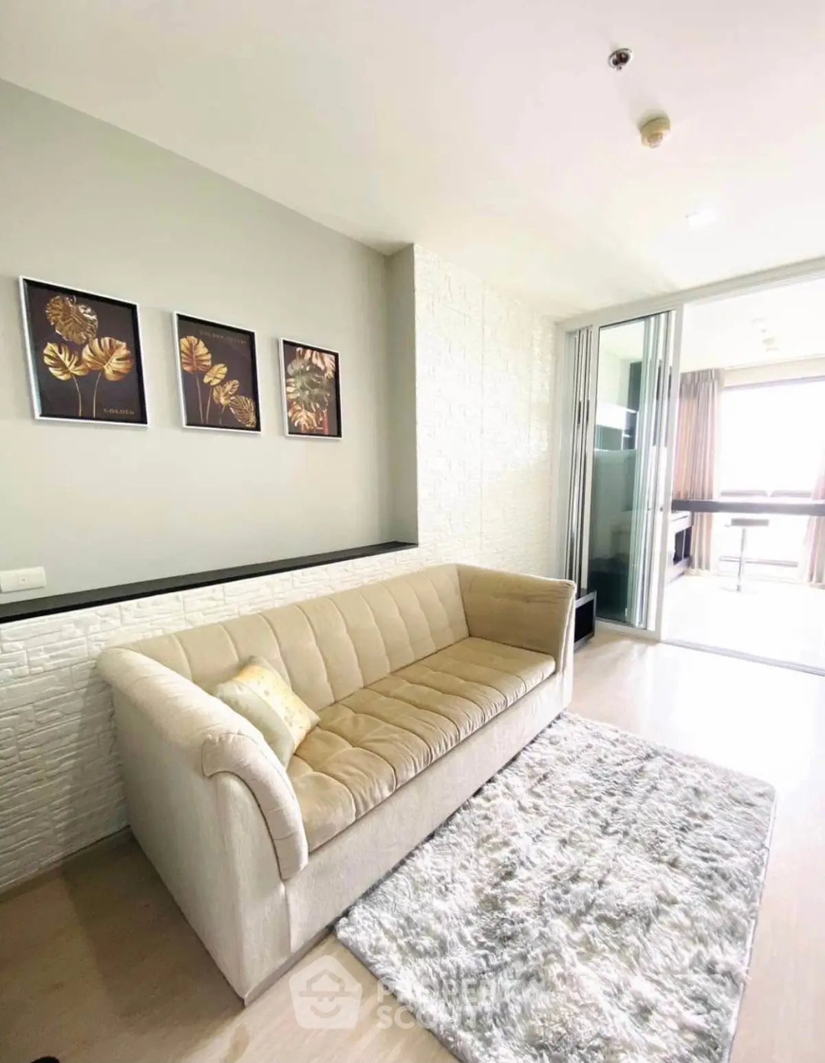 Stylish living room with plush sofa and modern decor in a bright apartment
