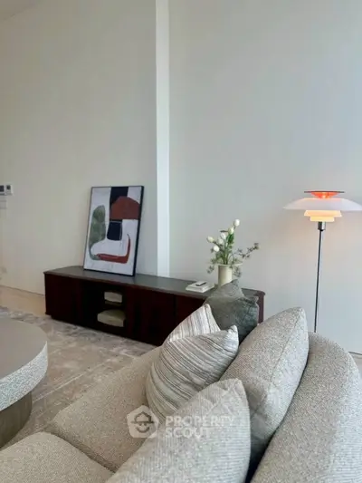 Modern living room with stylish decor and cozy seating area