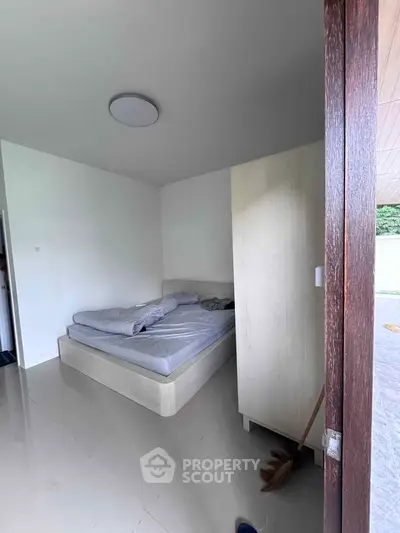 Cozy bedroom with minimalist design and natural light