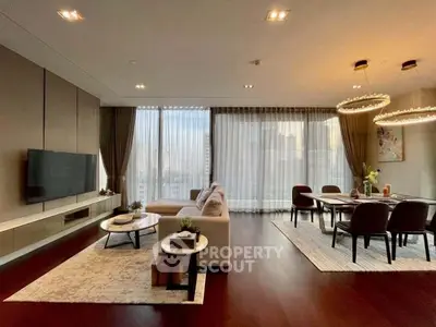 Luxurious modern living room with elegant dining area and floor-to-ceiling windows.