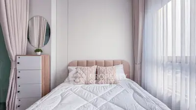 Cozy bedroom with elegant decor and natural light