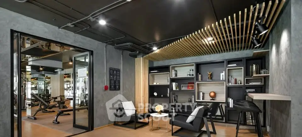 Modern gym with stylish interior and fitness equipment, featuring sleek design and contemporary decor.