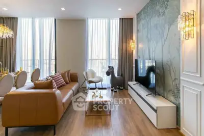 Luxurious modern living room with elegant decor and large windows