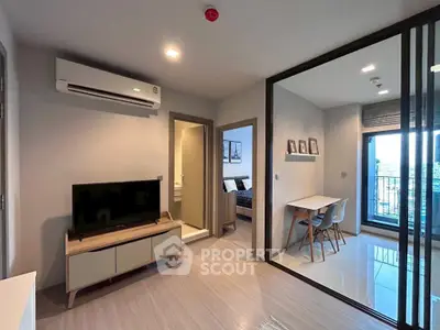 Modern apartment interior with open layout and balcony view