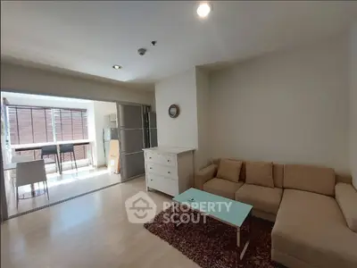 Spacious living room with modern furniture and natural light