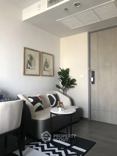 Modern living room with stylish decor and cozy seating area