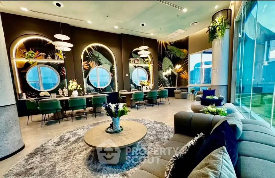 Luxurious modern living room with stylish decor and large windows offering stunning views.