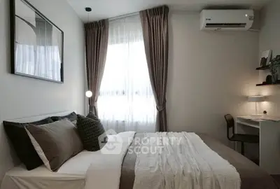 Cozy modern bedroom with stylish decor and natural light