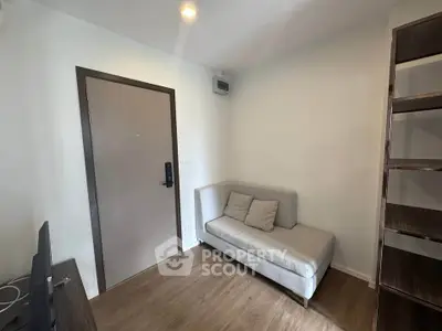 Cozy living room with modern sofa and wooden flooring