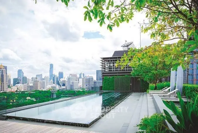 Luxurious rooftop pool with stunning city skyline view and lush greenery.