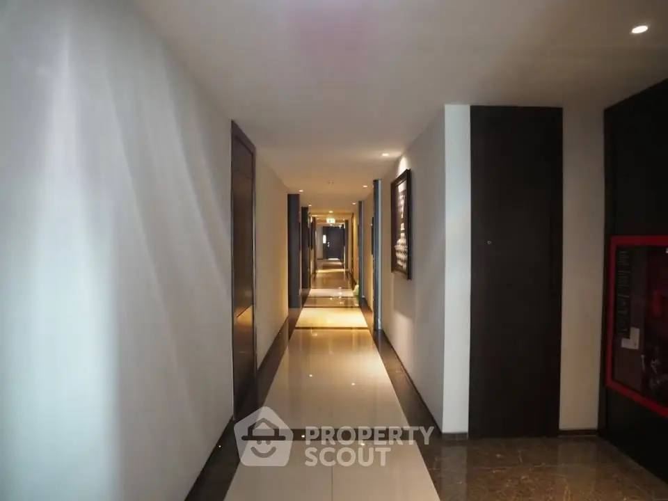 Elegant hotel corridor with modern lighting and sleek design