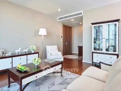 Elegant living room with modern furniture and stylish decor in a luxurious apartment.