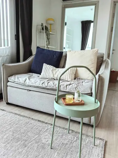 Chic modern living room with cozy sofa and stylish decor