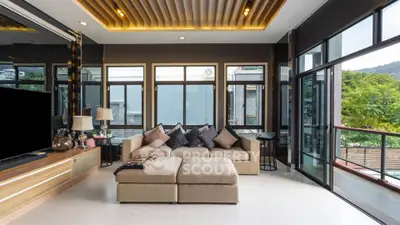 Luxurious living room with modern decor and stunning natural light.