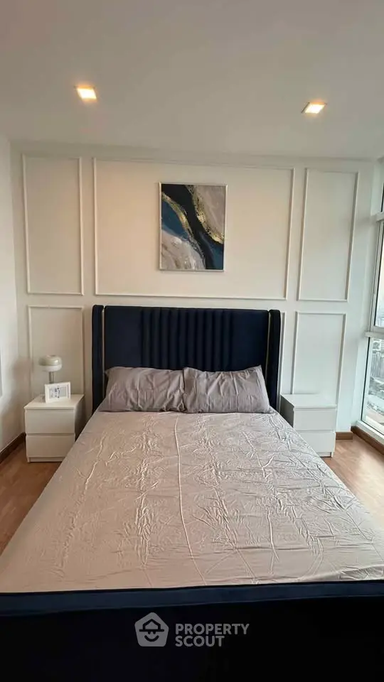 Modern bedroom with stylish bed and elegant decor