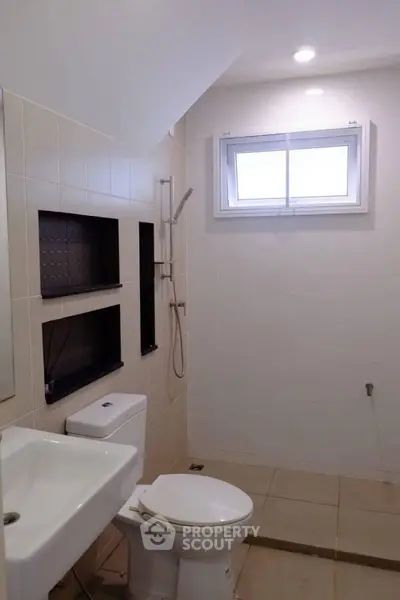 Modern bathroom with sleek fixtures and natural light
