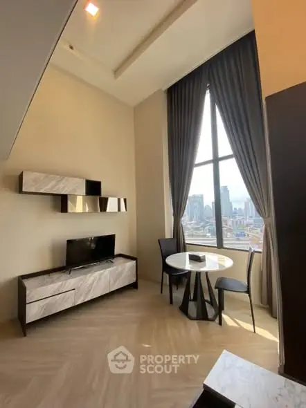 Modern living room with high ceiling and city view