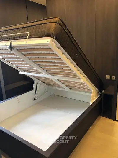 Modern bedroom with innovative storage bed design for space optimization