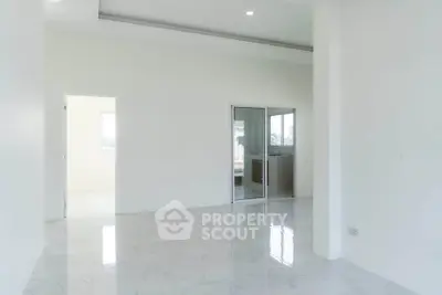 Spacious modern interior with glossy marble floors and sliding glass doors, perfect for customization.