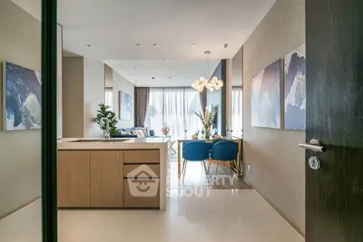 Luxurious open-plan living and dining area with modern decor and natural light