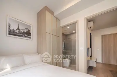 Modern bedroom with ensuite bathroom and stylish decor