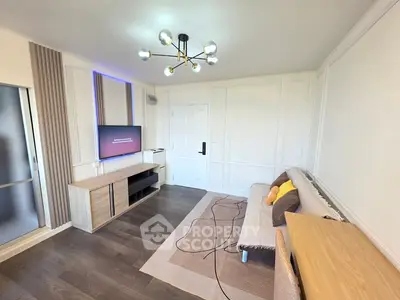 Modern living room with stylish lighting and sleek furniture design
