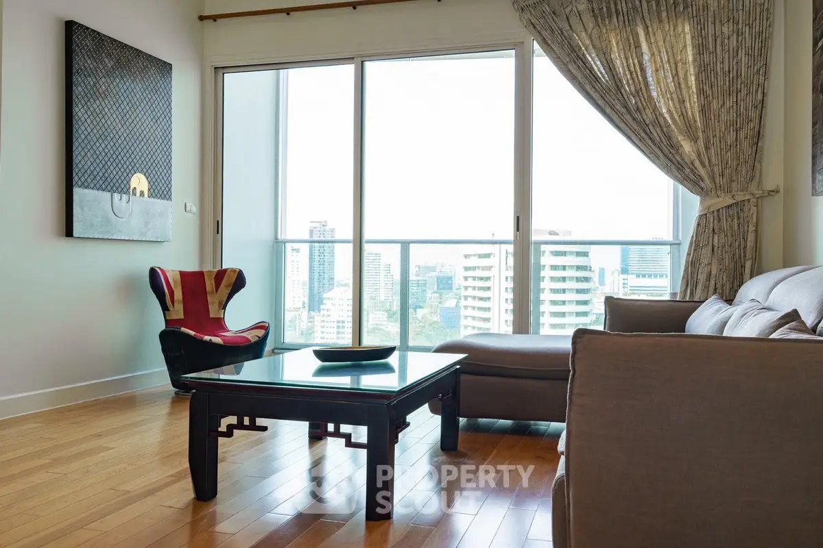 Modern living room with city view, stylish furniture, and large windows for natural light.