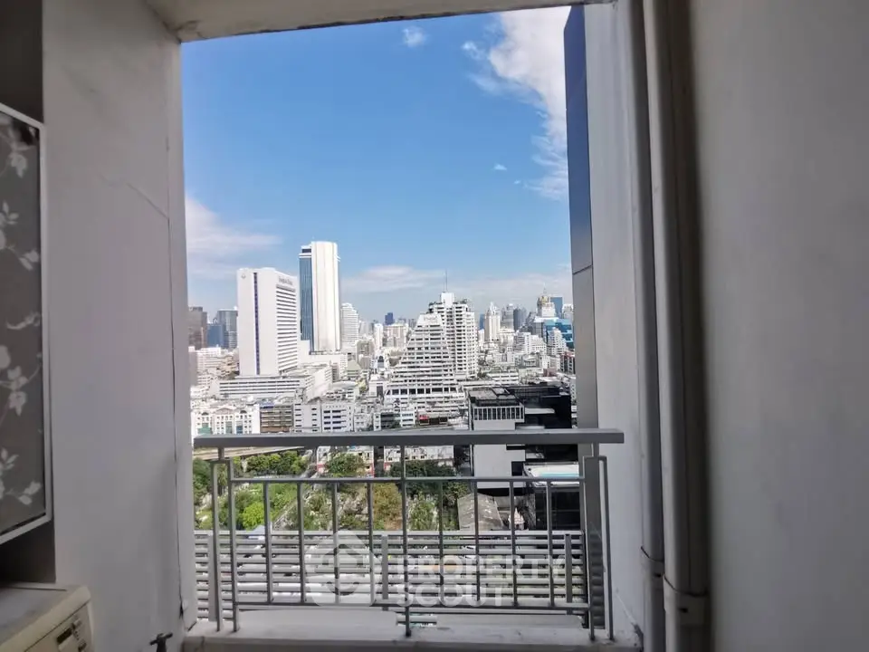 Stunning cityscape view from high-rise balcony, perfect for urban living enthusiasts.