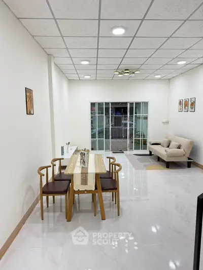 Spacious living room with modern furniture and elegant dining area