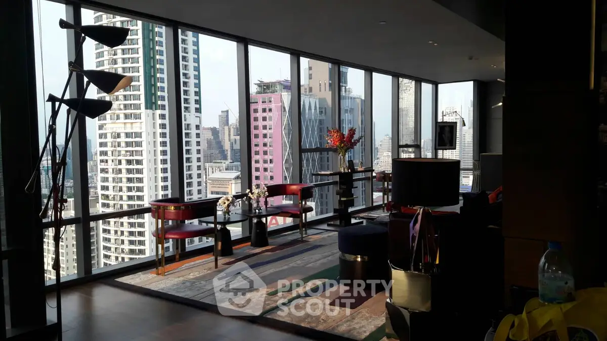 Luxurious high-rise living room with panoramic city views and modern decor