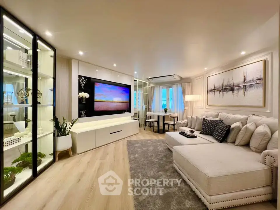 Luxurious living room with elegant decor and spacious seating area, perfect for relaxation and entertainment.