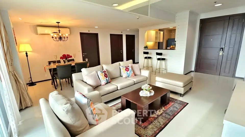 Spacious modern living room with elegant decor and open dining area