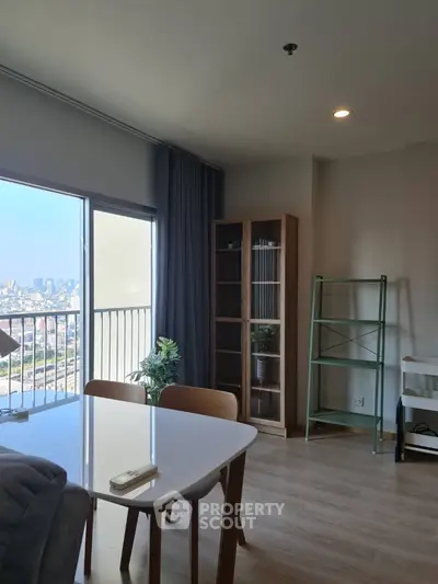 Modern living room with city view and stylish furniture