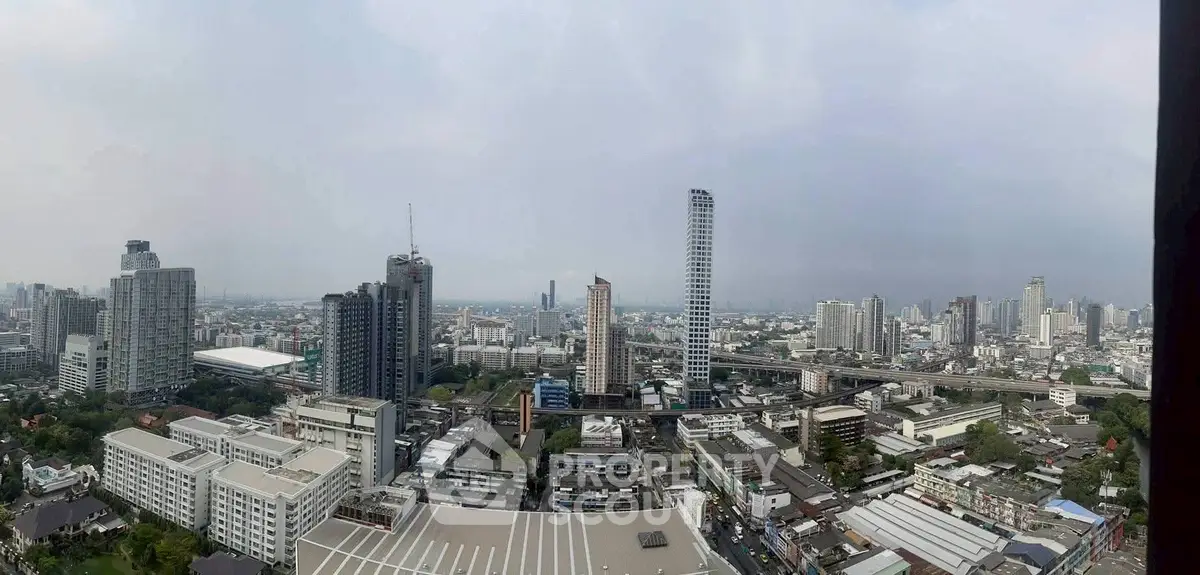 Stunning panoramic cityscape view showcasing modern skyscrapers and urban skyline.