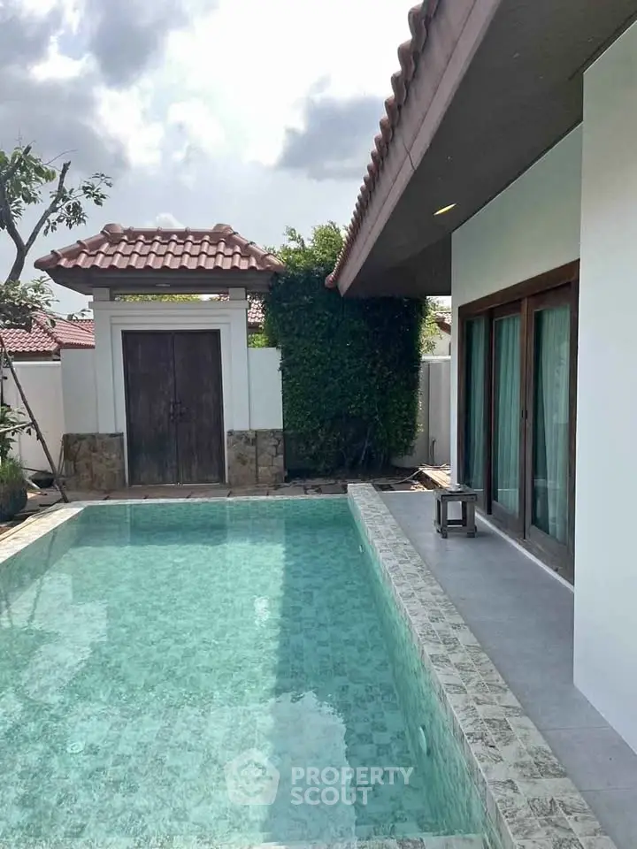 Luxurious villa with private pool and elegant architecture, perfect for serene living.