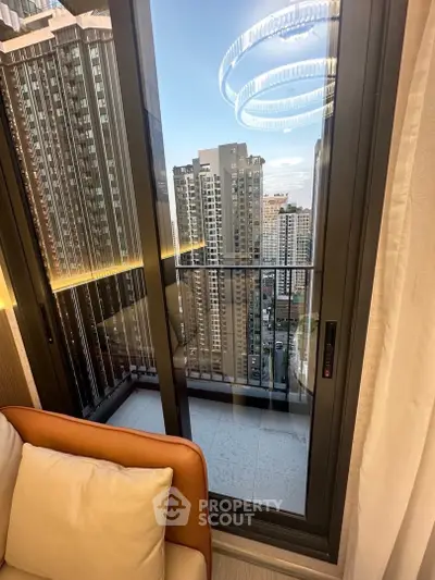 Stunning city view from modern apartment balcony with elegant lighting and cozy interior.