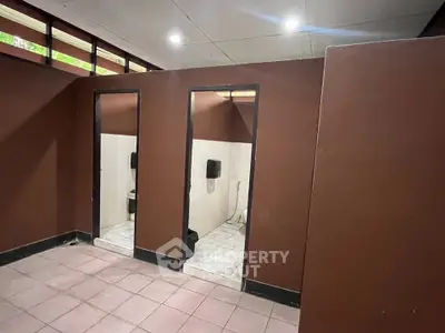 Spacious public restroom with modern design and clean facilities