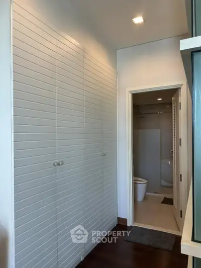 Modern bathroom with sleek design and ample storage space