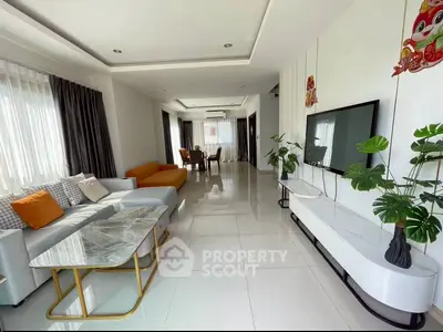 Spacious modern living room with elegant decor and natural light