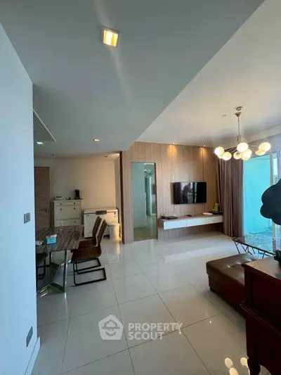 Modern living room with sleek design and elegant lighting