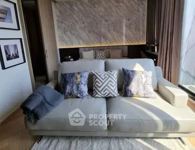 Luxurious living room with elegant sofa and stylish decor, perfect for modern living.