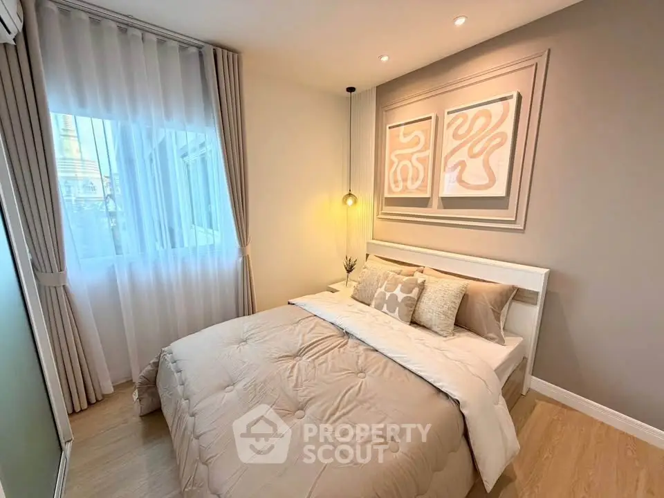 Cozy and stylish bedroom with modern decor and natural light